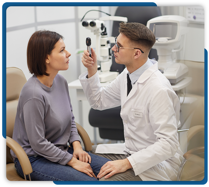 doctor-examine-patient-eye-at-standard-optical Doctor examine patient eye at Standard Optical