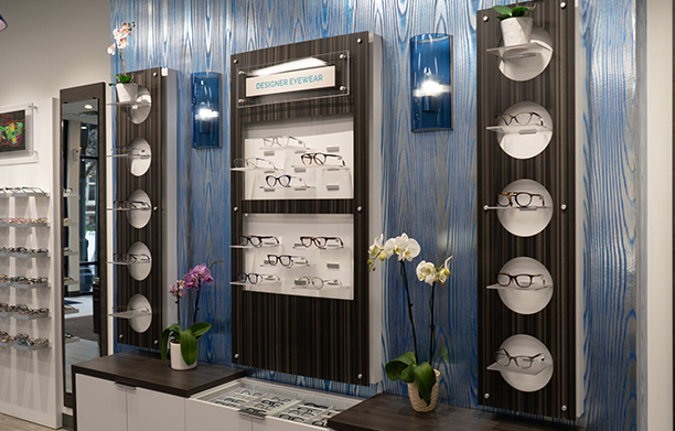 Pretty blue wall fixture for glasses at Standard Optical