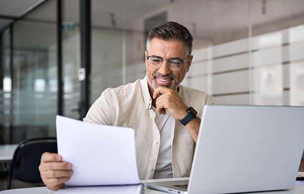 A man working at a computer.